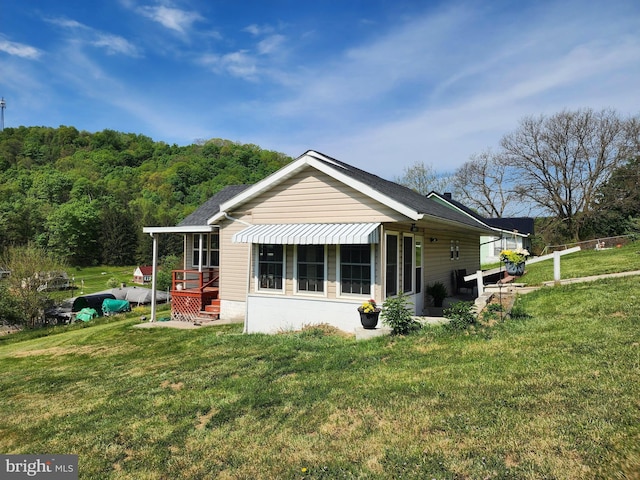 exterior space with a yard