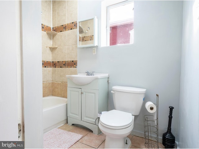full bathroom featuring vanity, toilet, and tile patterned flooring