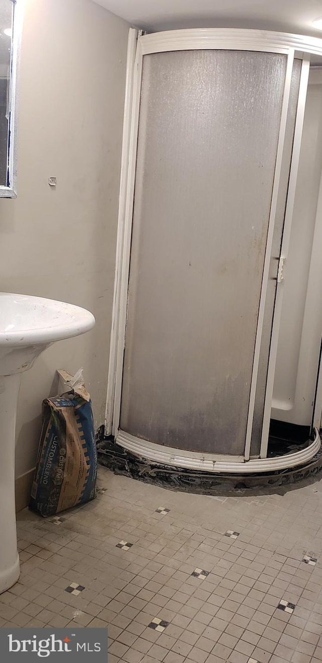 bathroom with tile patterned flooring