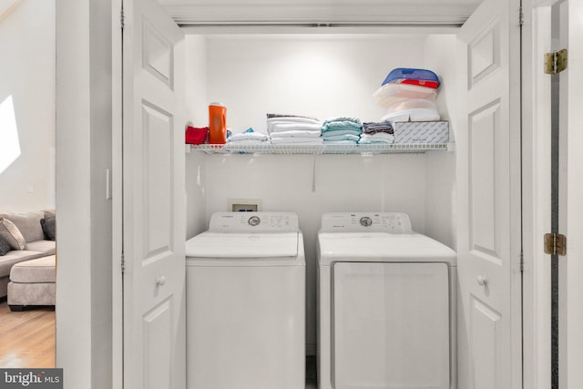 21 Heisler Ave, Charlestown, MD 21914 - washroom featuring washing machine and dryer and light wood-type flooring