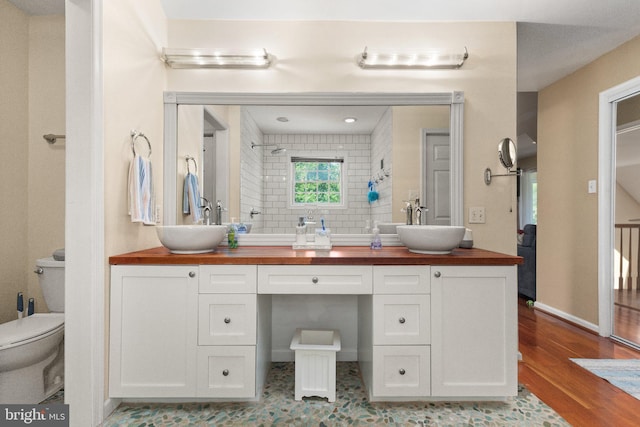 21 Heisler Ave, Charlestown, MD 21914 - full bathroom with double vanity, toilet, and wood finished floors