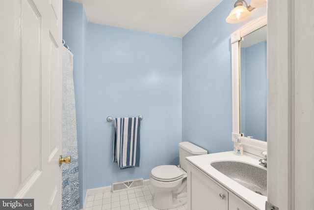 21 Heisler Ave, Charlestown, MD 21914 - bathroom featuring tile patterned flooring, toilet, vanity, and baseboards