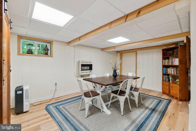 473 Cumberland Rd, Oakland, MD 21550 - dining space featuring heating unit, light wood-type flooring, and a paneled ceiling