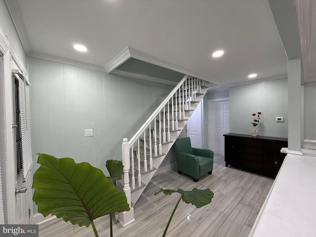 18 River Ln, Levittown, PA 19055 - stairs featuring ornamental molding, wood finished floors, and recessed lighting