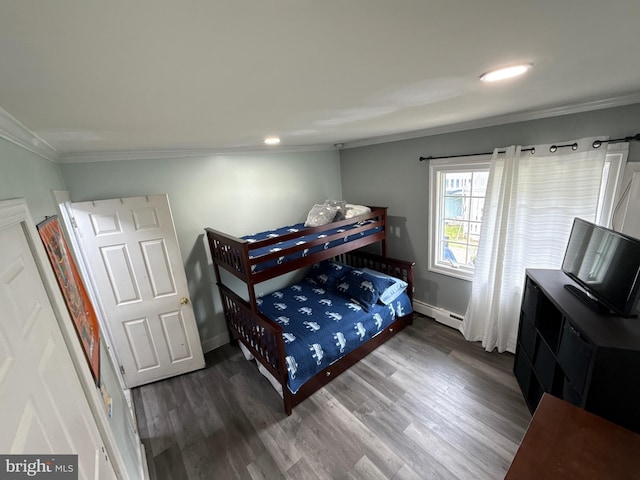 18 River Ln, Levittown, PA 19055 - bedroom with crown molding, wood finished floors, a baseboard heating unit, baseboards, and recessed lighting