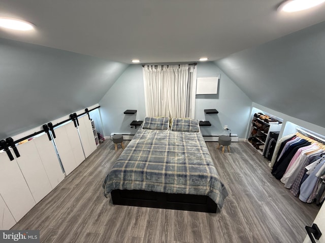 18 River Ln, Levittown, PA 19055 - bedroom featuring wood finished floors, lofted ceiling, baseboards, and recessed lighting