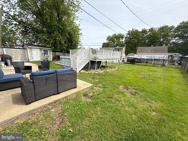 18 River Ln, Levittown, PA 19055 - view of yard featuring an outdoor hangout area and a deck