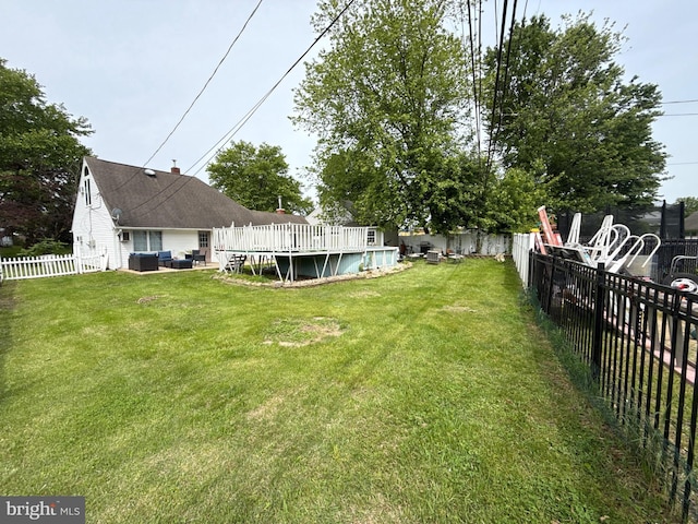 18 River Ln, Levittown, PA 19055 - view of yard featuring a deck and cooling unit