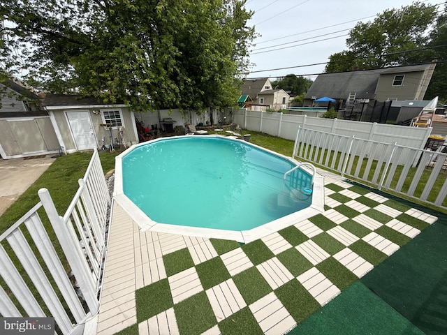 18 River Ln, Levittown, PA 19055 - view of swimming pool with a wooden deck
