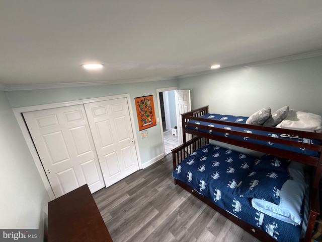 18 River Ln, Levittown, PA 19055 - bedroom featuring dark wood-style flooring, ornamental molding, a closet, recessed lighting, and baseboards