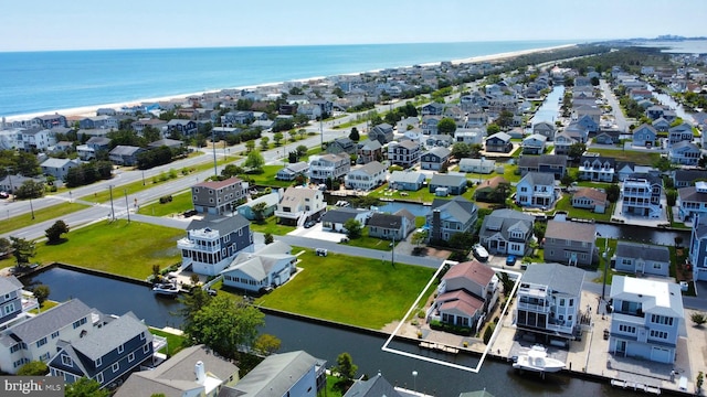 113 Henlopen Dr, South Bethany, DE 19930 - aerial view of residential area featuring property parcel outlined and a large body of water