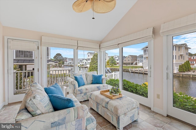 113 Henlopen Dr, South Bethany, DE 19930 - sunroom / solarium featuring a water view, a residential view, baseboards, and high vaulted ceiling