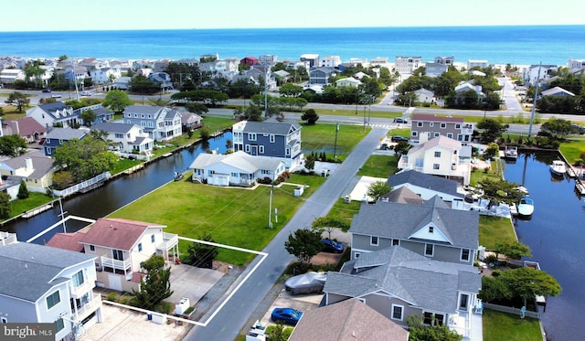 113 Henlopen Dr, South Bethany, DE 19930 - aerial view of residential area featuring a nearby body of water and property parcel outlined