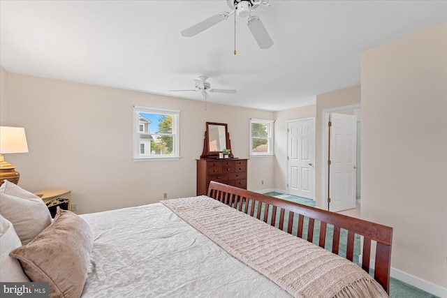 113 Henlopen Dr, South Bethany, DE 19930 - carpeted bedroom with baseboards, ceiling fan, and a closet