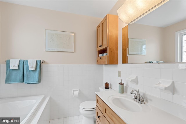 113 Henlopen Dr, South Bethany, DE 19930 - full bath with tile walls, a garden tub, toilet, vanity, and tile patterned floors