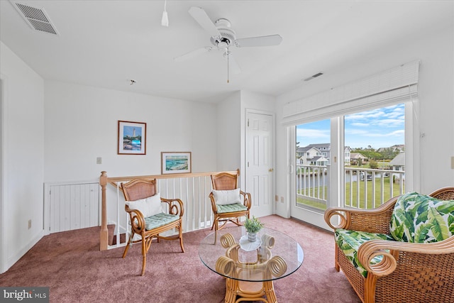 113 Henlopen Dr, South Bethany, DE 19930 - sitting room with carpet floors, a water view, and a ceiling fan