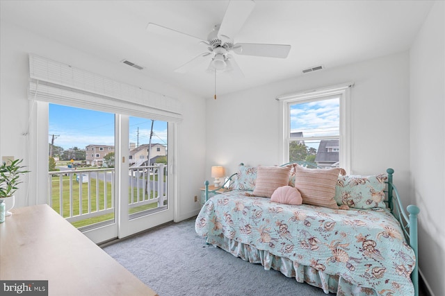 113 Henlopen Dr, South Bethany, DE 19930 - carpeted bedroom featuring access to outside and ceiling fan