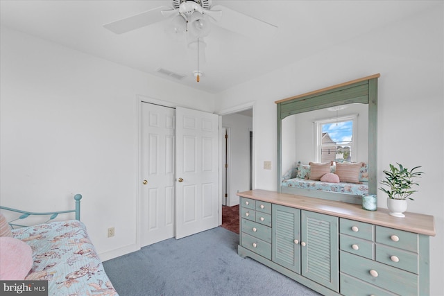 113 Henlopen Dr, South Bethany, DE 19930 - carpeted bedroom featuring a closet, baseboards, and a ceiling fan