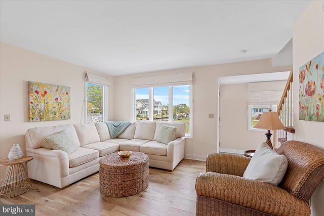 113 Henlopen Dr, South Bethany, DE 19930 - living room featuring light wood-type flooring and baseboards