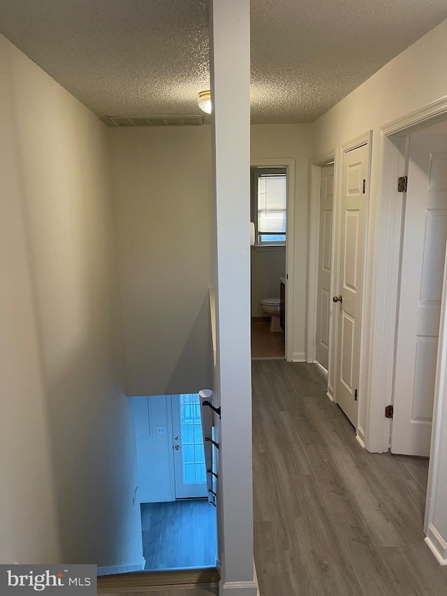 409 Connecticut Ave, Norfolk, VA 23508 - stairway with a textured ceiling, baseboards, visible vents, and wood finished floors