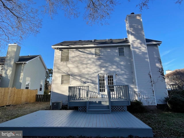 409 Connecticut Ave, Norfolk, VA 23508 - back of house featuring fence, a wooden deck, a chimney, and central AC