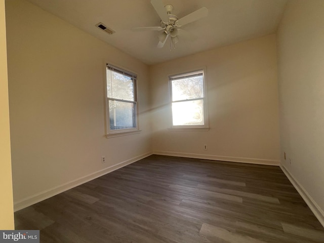409 Connecticut Ave, Norfolk, VA 23508 - empty room featuring baseboards, ceiling fan, visible vents, and dark wood-style flooring