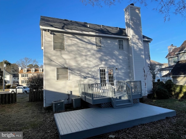 409 Connecticut Ave, Norfolk, VA 23508 - rear view of house with a wooden deck, a chimney, and central AC