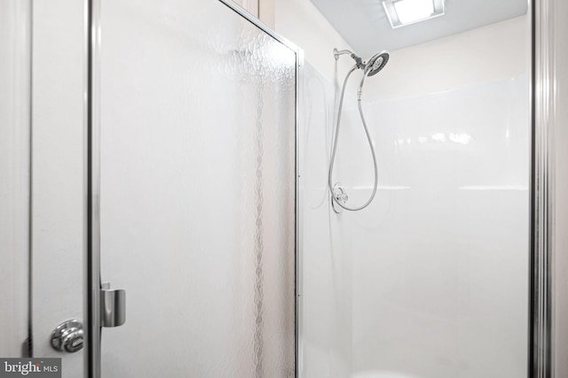 bathroom featuring a stall shower