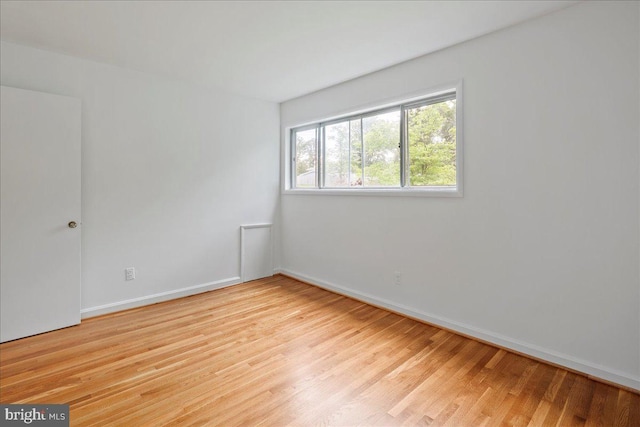 8815 Beauchamp Dr, Alexandria, VA 22309 - unfurnished room with light wood-style flooring and baseboards