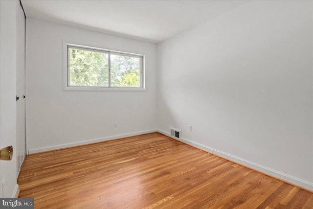 8815 Beauchamp Dr, Alexandria, VA 22309 - spare room featuring light wood-style floors and baseboards
