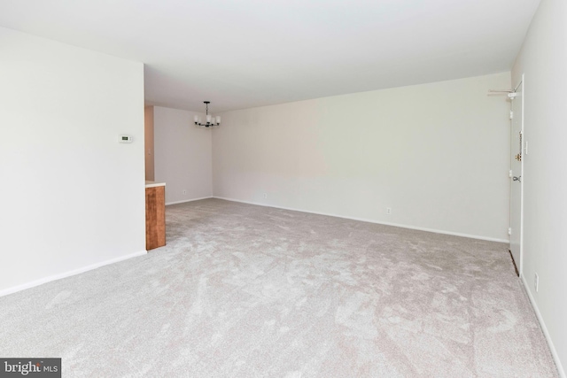 3712 N Rosser St Unit 201, Alexandria, VA 22311 - unfurnished room featuring a chandelier, carpet floors, and baseboards
