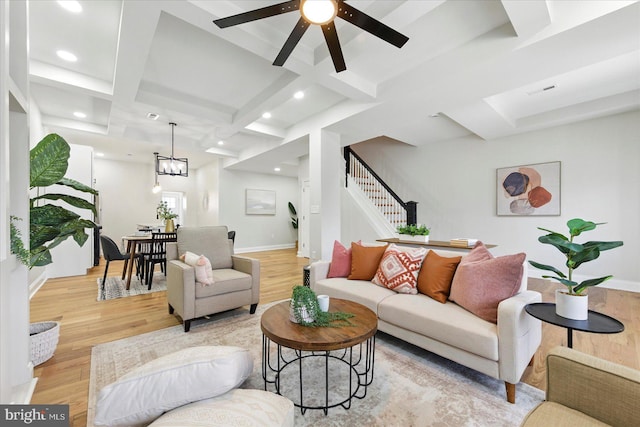 2424 W Lanvale St, Baltimore, MD 21216 - living area with light wood finished floors, stairs, coffered ceiling, ceiling fan, and beamed ceiling