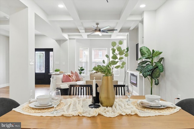 2424 W Lanvale St, Baltimore, MD 21216 - dining area featuring beam ceiling, wood finished floors, coffered ceiling, plenty of natural light, and a ceiling fan