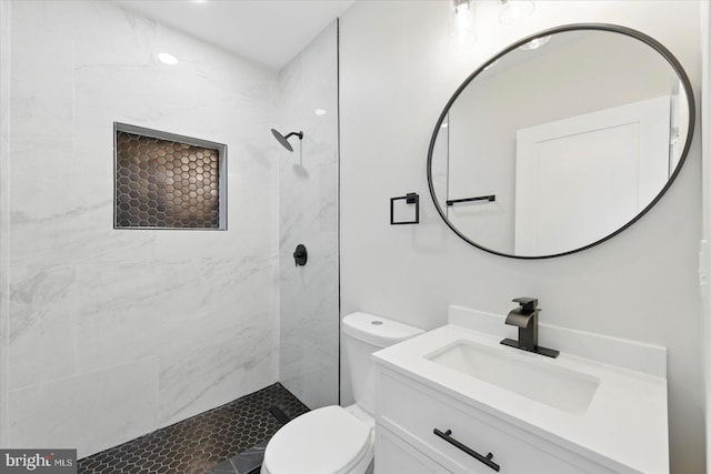 2424 W Lanvale St, Baltimore, MD 21216 - full bathroom with toilet, tiled shower, and vanity