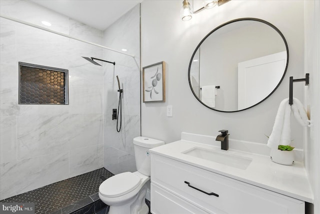 2424 W Lanvale St, Baltimore, MD 21216 - bathroom with vanity, toilet, and tiled shower
