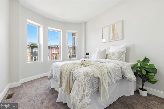 2424 W Lanvale St, Baltimore, MD 21216 - carpeted bedroom with baseboards