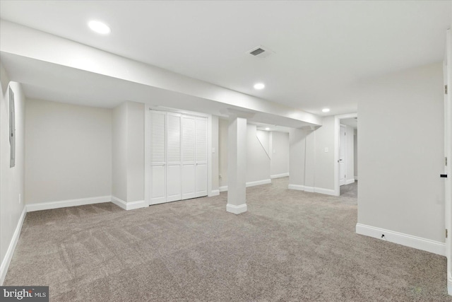 2424 W Lanvale St, Baltimore, MD 21216 - finished below grade area with carpet, baseboards, and recessed lighting