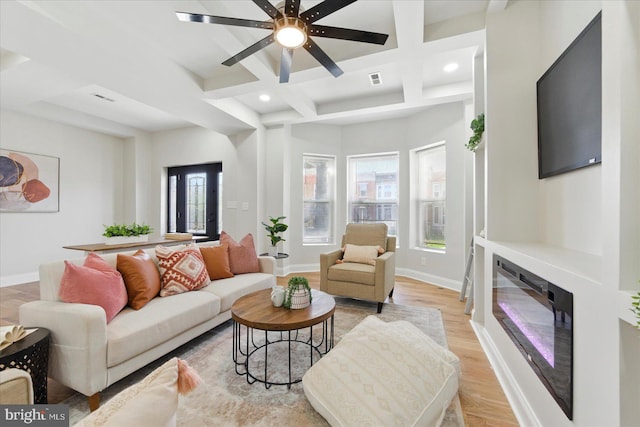 2424 W Lanvale St, Baltimore, MD 21216 - living room with coffered ceiling, healthy amount of natural light, recessed lighting, ceiling fan, and baseboards