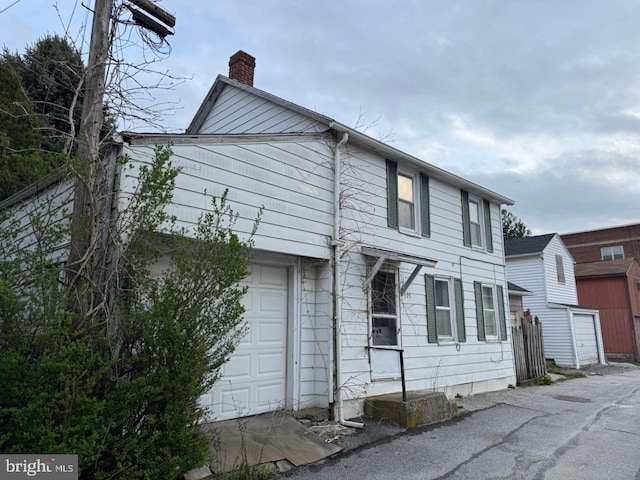 view of front of property featuring a chimney