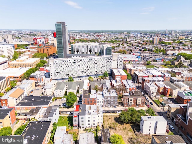 birds eye view of property with a view of city