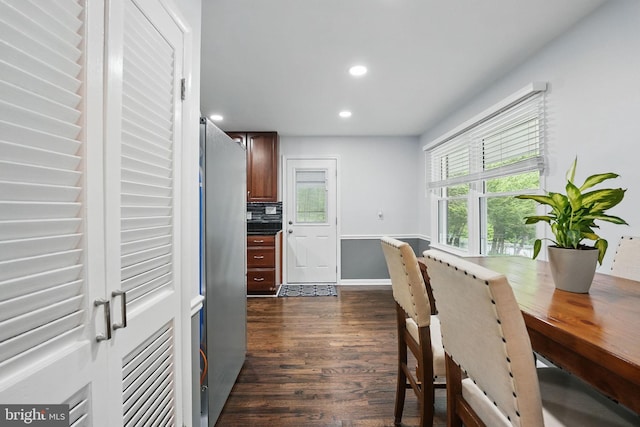 6404 Yates Ford Rd, Manassas, VA 20111 - dining room with dark wood-type flooring, recessed lighting, and baseboards