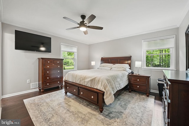 6404 Yates Ford Rd, Manassas, VA 20111 - bedroom featuring crown molding, dark wood finished floors, baseboards, and a ceiling fan