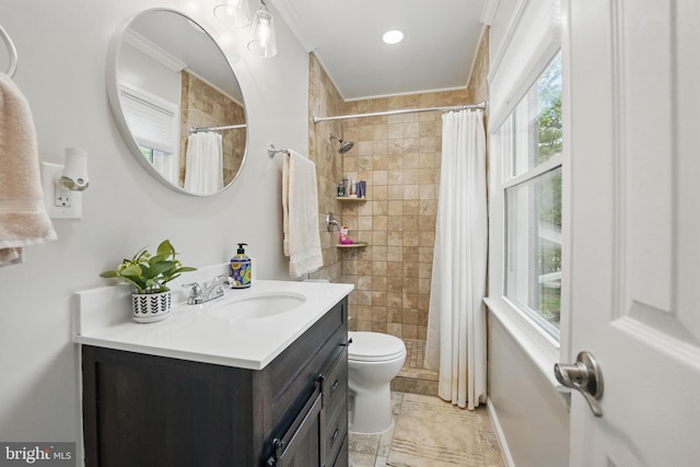 6404 Yates Ford Rd, Manassas, VA 20111 - full bathroom with crown molding, vanity, toilet, and tiled shower