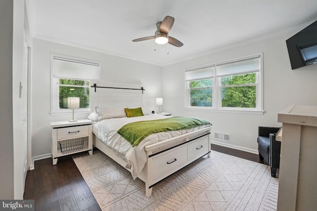 6404 Yates Ford Rd, Manassas, VA 20111 - bedroom with multiple windows, wood finished floors, crown molding, and baseboards