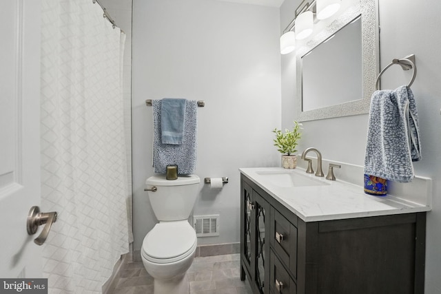 6404 Yates Ford Rd, Manassas, VA 20111 - full bath featuring vanity, toilet, and baseboards