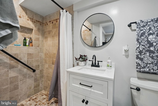 6404 Yates Ford Rd, Manassas, VA 20111 - bathroom featuring tiled shower, vanity, and toilet
