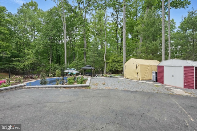 6404 Yates Ford Rd, Manassas, VA 20111 - view of asphalt road featuring view of scattered trees