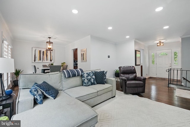 6404 Yates Ford Rd, Manassas, VA 20111 - living area with dark wood-style floors, plenty of natural light, recessed lighting, ornamental molding, and baseboards