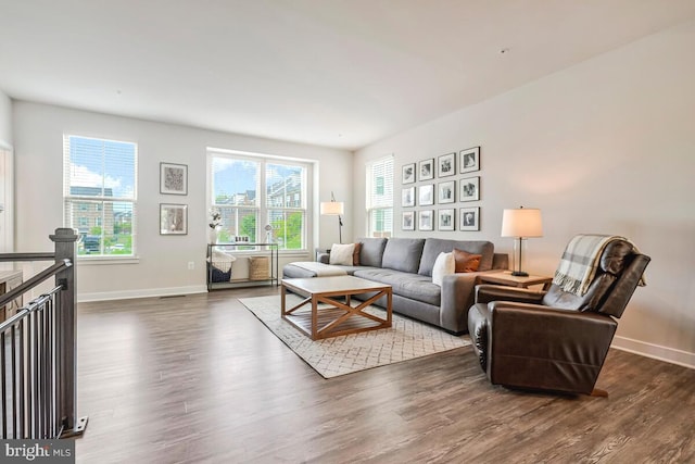 14540 Grace Kellen Ave, Brandywine, MD 20613 - living area featuring dark wood-type flooring and baseboards