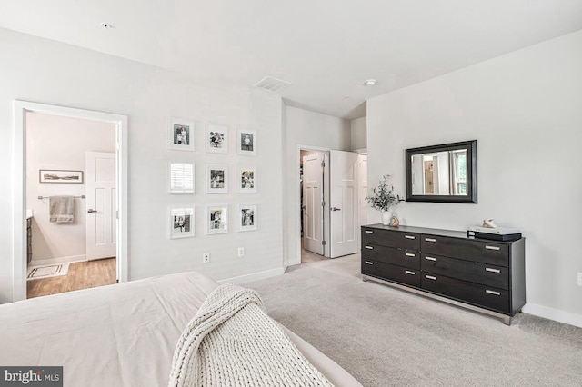 14540 Grace Kellen Ave, Brandywine, MD 20613 - bedroom with baseboards, light colored carpet, and ensuite bath